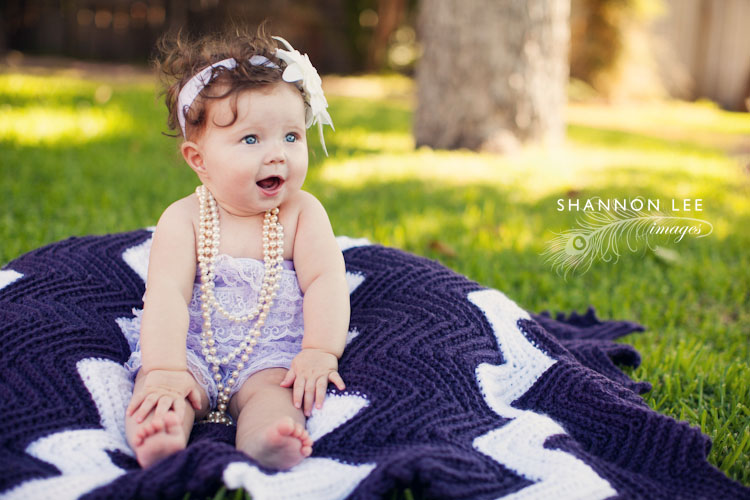baby girl in pearls
