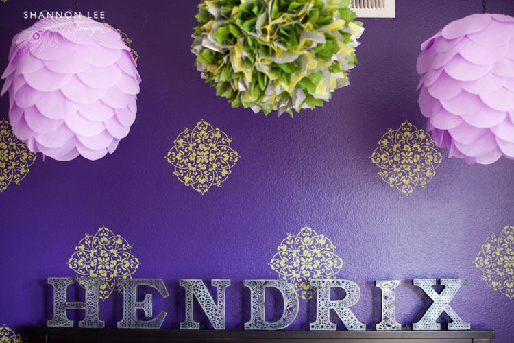 purple and green baby room
