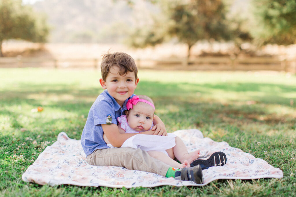 big brother holding his baby sister | los angeles family photographer